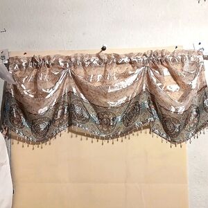 Sheer volleyball beaded valance